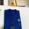 A Navy blue, Tiny Flap, Gold bee crown details African traditional senator kaftan native.