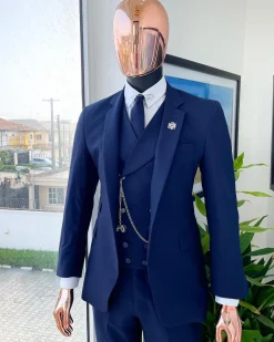 A Navy blue, tiny square-patterned Jorgecarli Super 140’s “Board Room” notch lapel suit