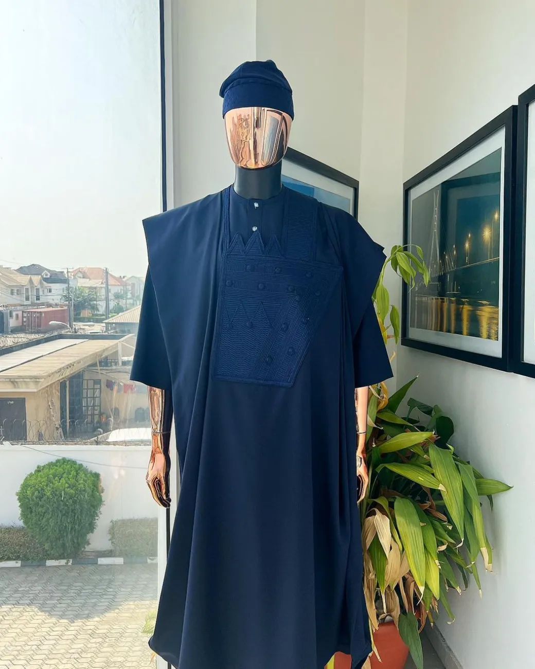 A Navy blue, triple v, squared 7 monochrome embroidery details Agbada