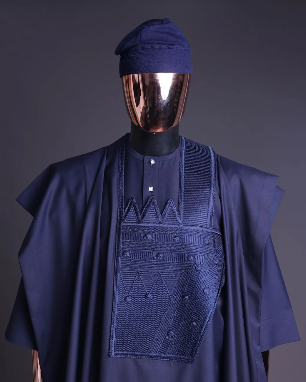 A Navy blue, triple v, squared 7 monochrome embroidery details Agbada