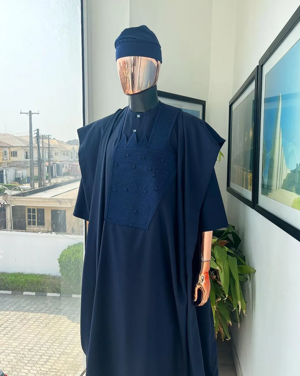 A Navy blue, triple v, squared 7 monochrome embroidery details Agbada