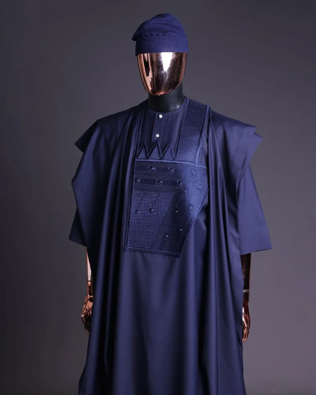 A Navy blue, triple v, squared 7 monochrome embroidery details Agbada