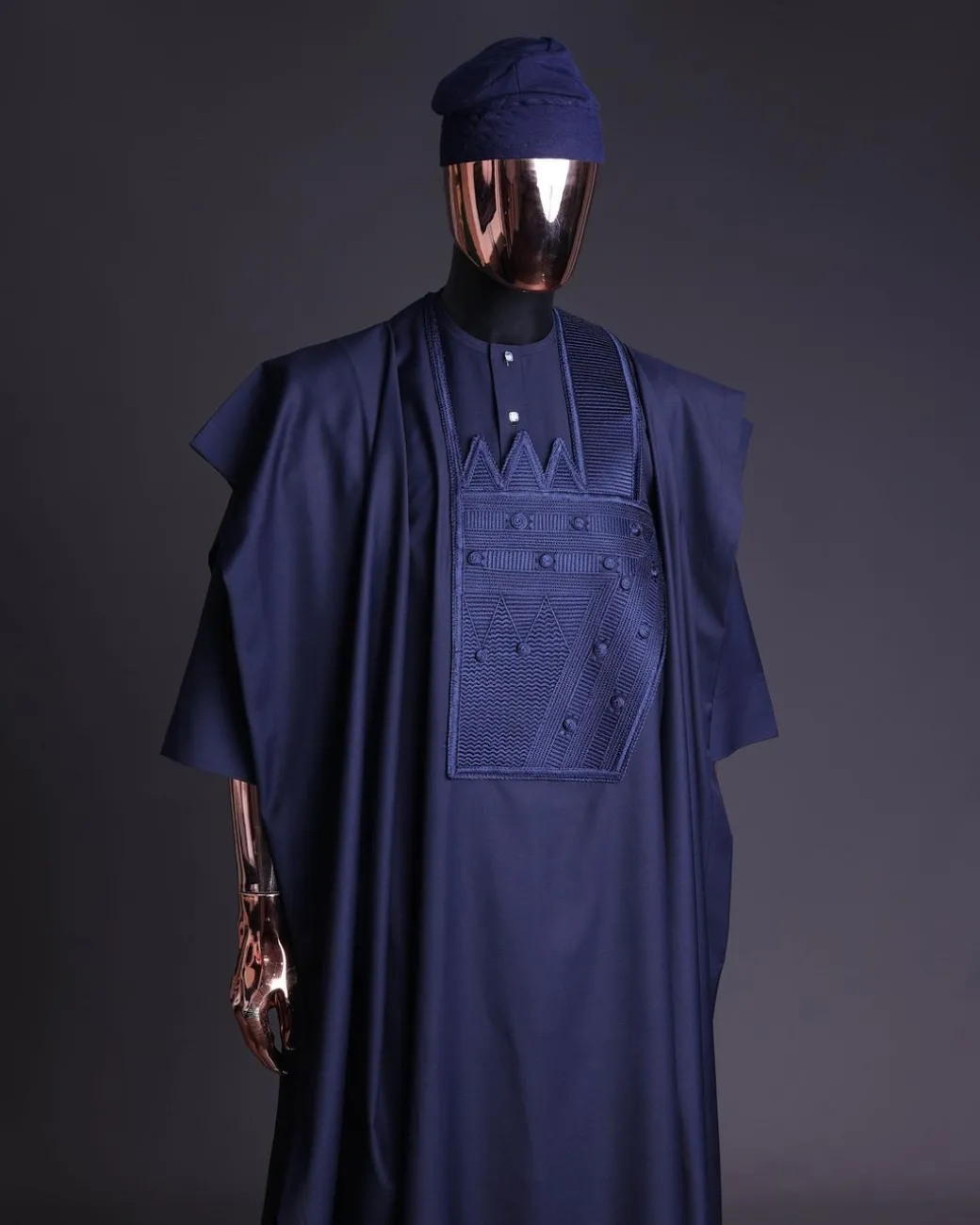 A Navy blue, triple v, squared 7 monochrome embroidery details Agbada