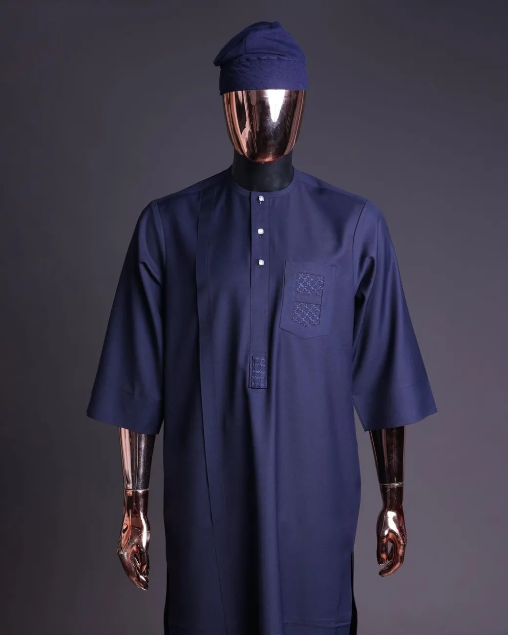 A Navy Blue, v and square shaped pocket with net embroidery details, 3/4 sleeve African senator Kaftan native.