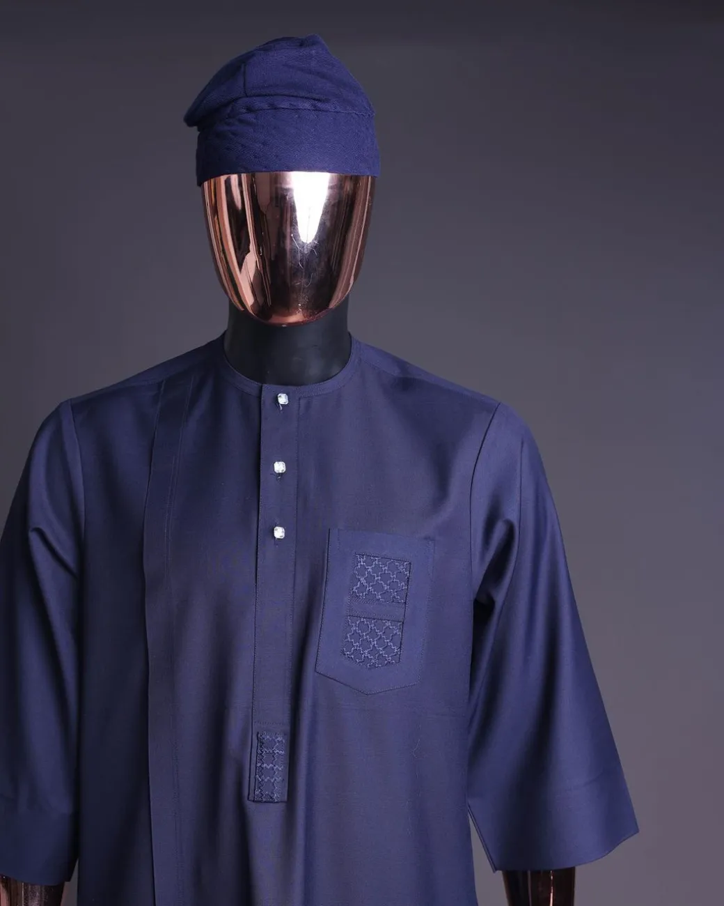 A Navy Blue, v and square shaped pocket with net embroidery details, 3/4 sleeve African senator Kaftan native.