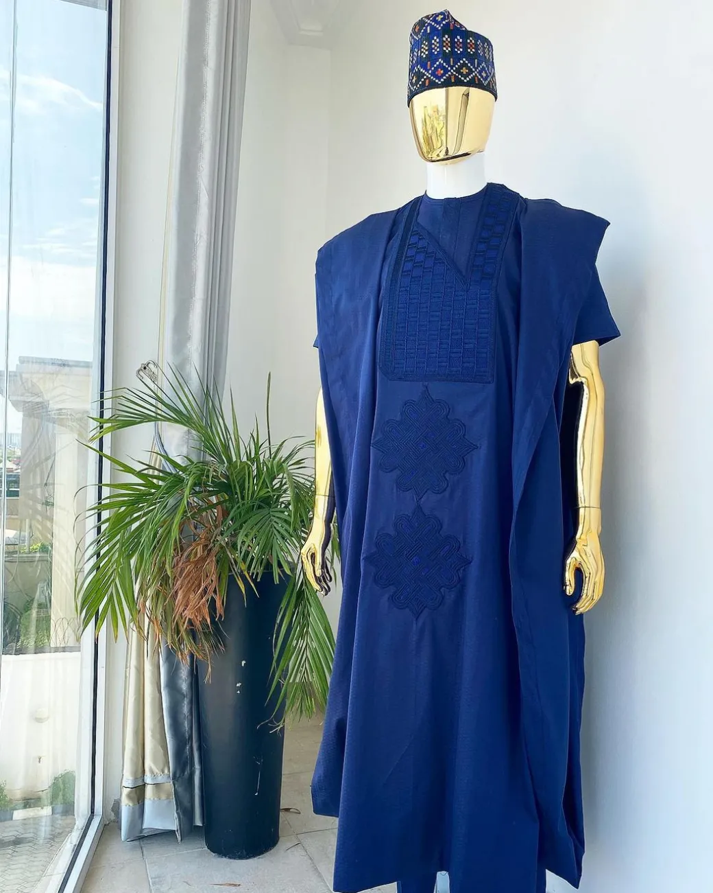 A Navy Blue Voil agbada with dotted lines embroidery design, kaftan and sokoto
