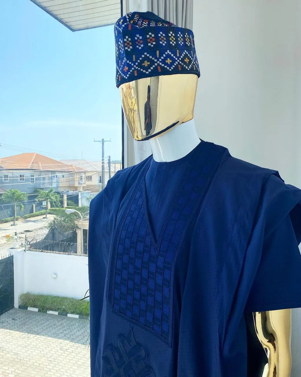 A Navy Blue Voil agbada with dotted lines embroidery design, kaftan and sokoto