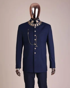 A navy blue, “wakanda” embroidery square patterned metallic jacquard safari suit
