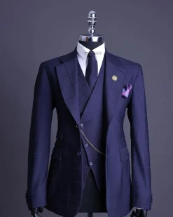 A Navy blue, windowpane check, monochrome nobility super “140s” “Board Room” Notch lapel suit