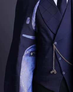 A Navy blue, windowpane check, monochrome nobility super “140s” “Board Room” Notch lapel suit