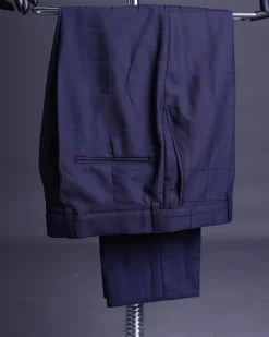 A Navy blue, windowpane check, monochrome nobility super “140s” “Board Room” Notch lapel suit