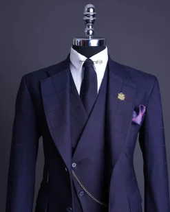 A Navy blue, windowpane check, monochrome nobility super “140s” “Board Room” Notch lapel suit