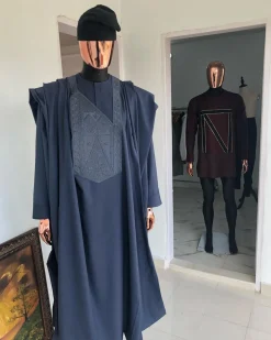 A Navy Blue with connected embroidery Agbada and Hand woven Yoruba Hat