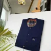 A Navy Blue With mixed Swarovski buttons detailing African Kaftan