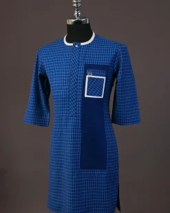A Neon blue, graph check, front flap with Swarovski button details, and layered pocket traditional senator kaftan native