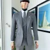 A “peaky blinders” Lava Grey, herringbone-patterned fabric, Jorgecarli Super 140’s “Board Room” notch lapel suit
