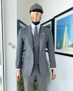 A “peaky blinders” Lava Grey, herringbone-patterned fabric, Jorgecarli Super 140’s “Board Room” notch lapel suit