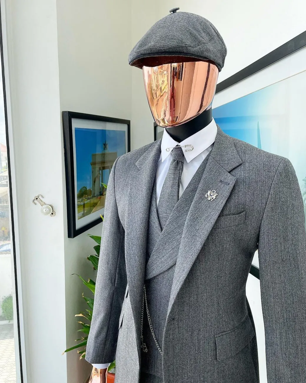 A “peaky blinders” Lava Grey, herringbone-patterned fabric, Jorgecarli Super 140’s “Board Room” notch lapel suit