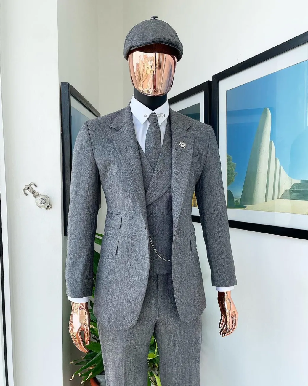 A “peaky blinders” Lava Grey, herringbone-patterned fabric, Jorgecarli Super 140’s “Board Room” notch lapel suit