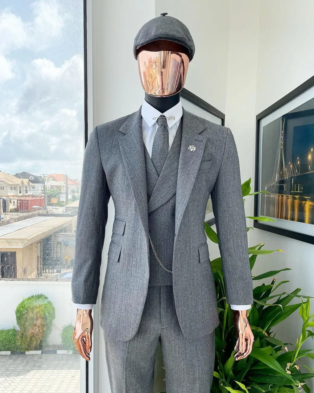 A “peaky blinders” Lava Grey, herringbone-patterned fabric, Jorgecarli Super 140’s “Board Room” notch lapel suit