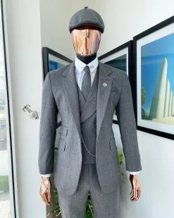 A “peaky blinders” Lava Grey, herringbone-patterned fabric, Jorgecarli Super 140’s “Board Room” notch lapel suit