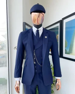 A “peaky blinders” navy blue, tiny square patterned – Jorgecarli super 140’s- “Board Room” suit
