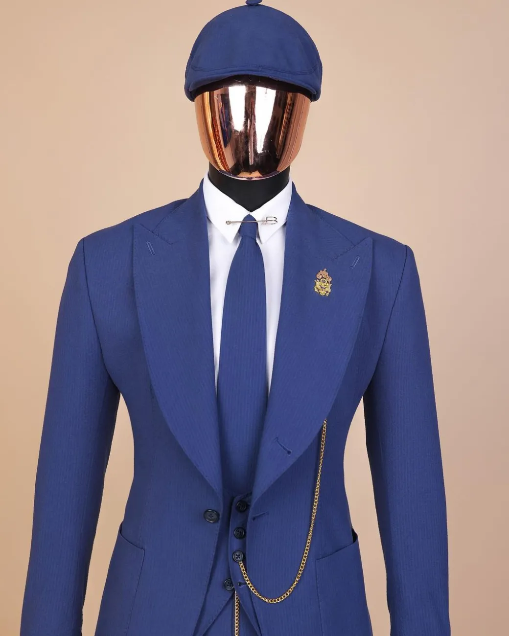 A “peaky blinders” navy blue seersucker fabric knitted peak lapel suit