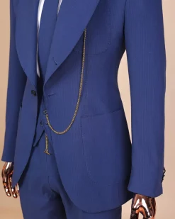 A “peaky blinders” navy blue seersucker fabric knitted peak lapel suit