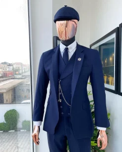 A “peaky blinders” navy blue, tiny square patterned – Jorgecarli super 140’s- “Board Room” suit