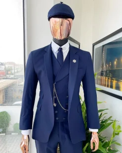 A “peaky blinders” navy blue, tiny square patterned – Jorgecarli super 140’s- “Board Room” suit