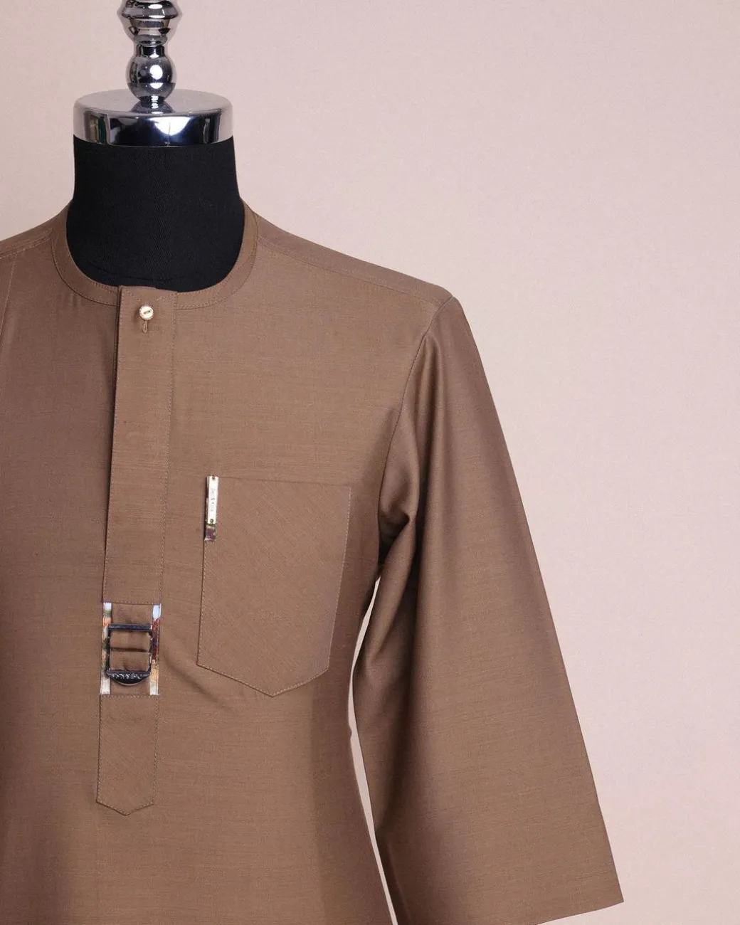 A Peanut brown, front flap,interwoven buckle, 3/4 sleeve African senator kaftan native.