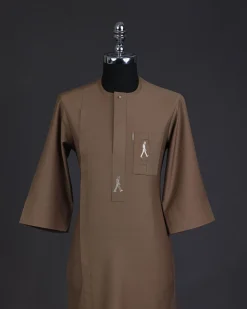 A Peanut brown, front flap, walking paul embroidery details, 3/4 sleeve African senator kaftan native.