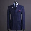 A Pencil stripe and navy blue – Jorgecarli – peak lapel double breasted suit