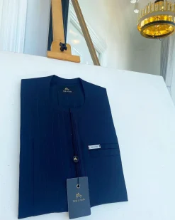 A pencil stripe midnight blue, lanes pocket, lanes front flap African traditional senator kaftan native.