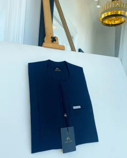 A pencil stripe midnight blue, lanes pocket, lanes front flap African traditional senator kaftan native.