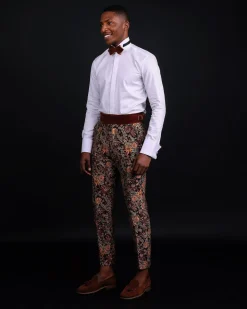 A pencil-cut, brown-mix metallic floral jacquard side strap with metal adjuster pant