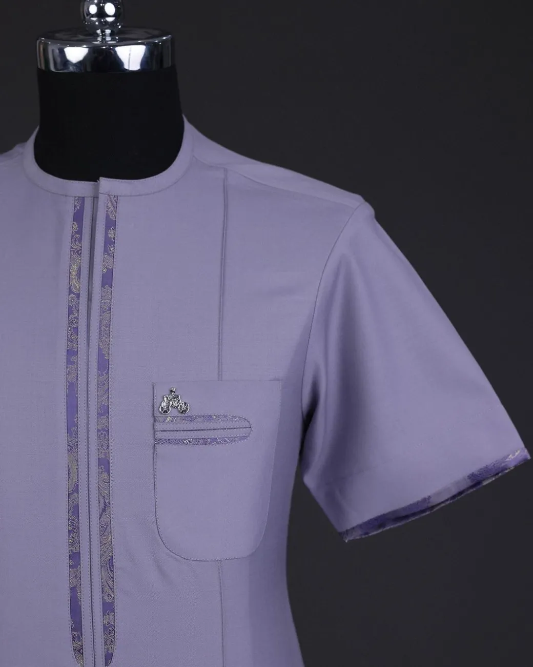 A periwinkle purple, zip line, paisley details, short sleeve African senator kaftan native.