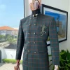 A phthalo green and clay orange windowpane check “preacher” double breasted safari suit