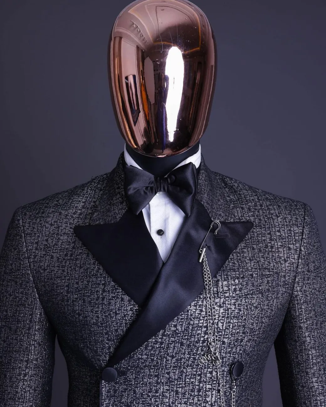 A “pirate” metallic jacquard, layered double breasted, 10 buttons, peak lapel tuxedo suit