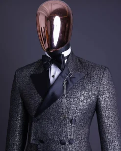 A “pirate” metallic jacquard, layered double breasted, 10 buttons, peak lapel tuxedo suit