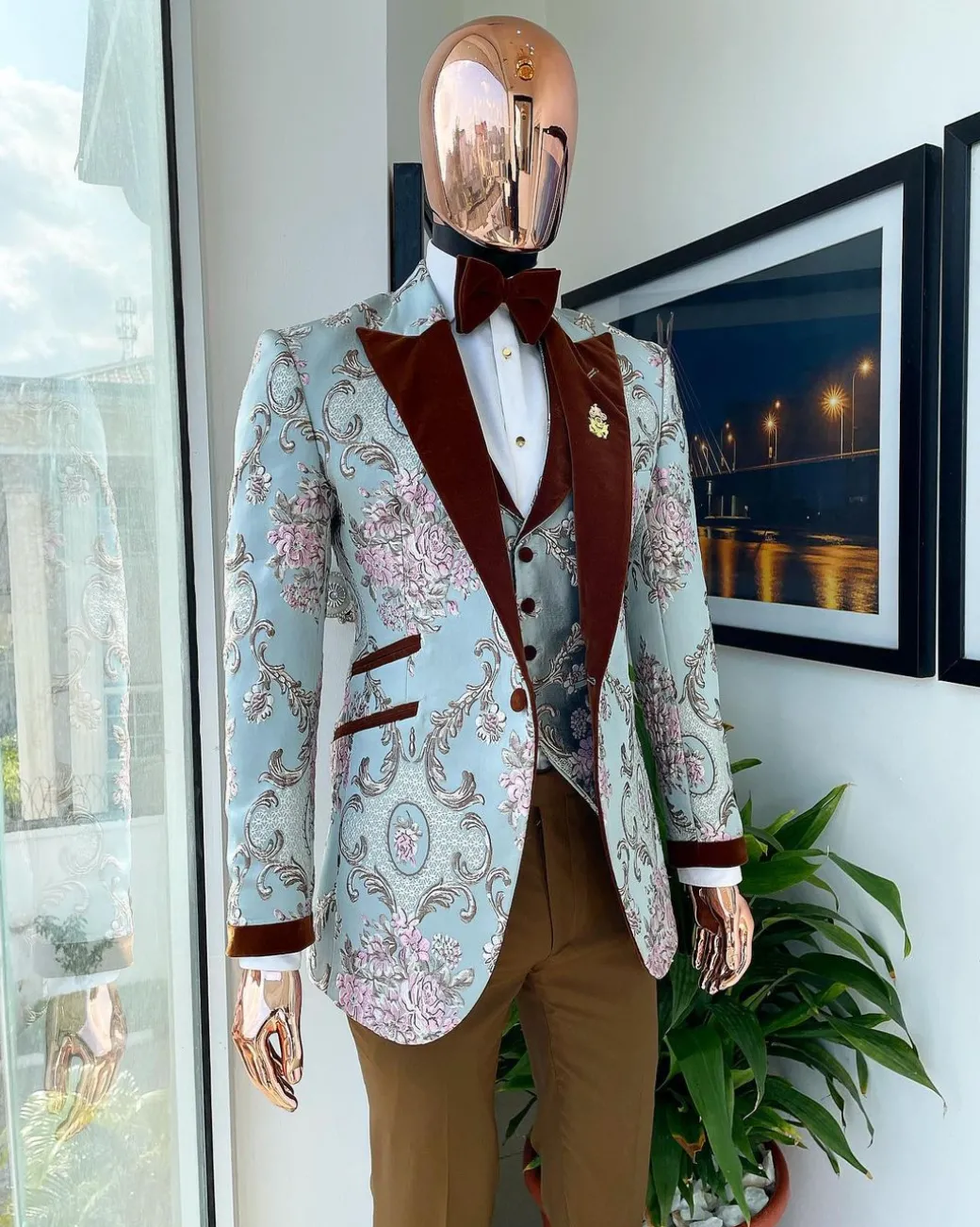 A pistachio green, pink and brown floral metallic jacquard tuxedo suit