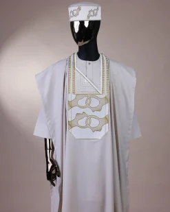 A porcelain, connected medulla and wooven pattern embroidery detailing agbada