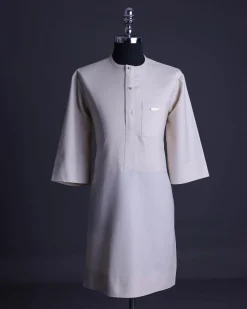 A Porcelain, front flap with gold Swarovski button, patch pocket, 3/4 sleeve African senator kaftan native.