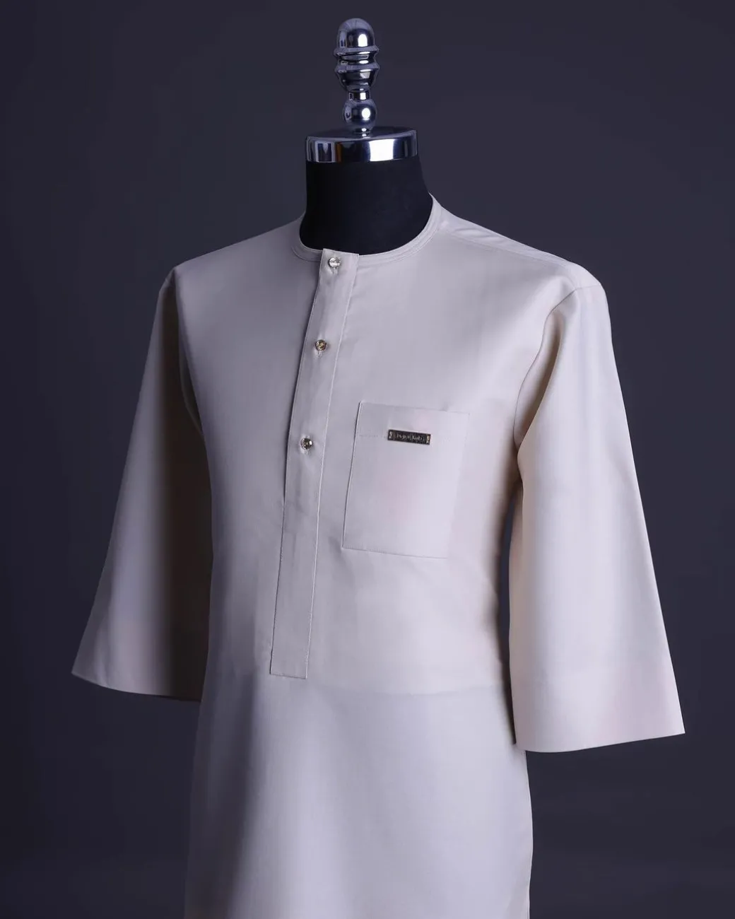 A Porcelain, front flap with gold Swarovski button, patch pocket, 3/4 sleeve African senator kaftan native.