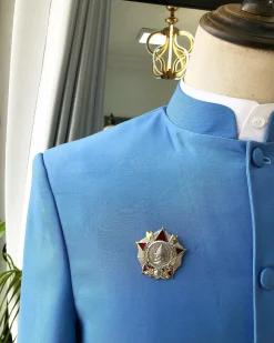 A Powdered Blue “clergyman” French safari Suit