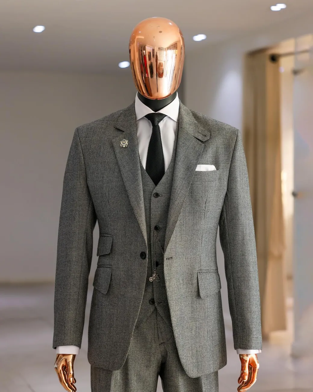 A Prince Of Wales Check Business Suit.
