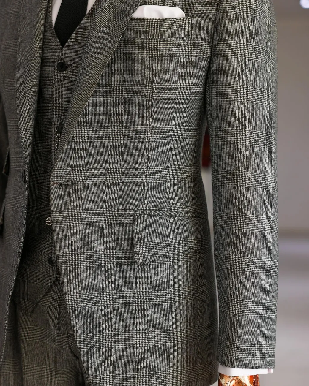 A Prince Of Wales Check Business Suit.