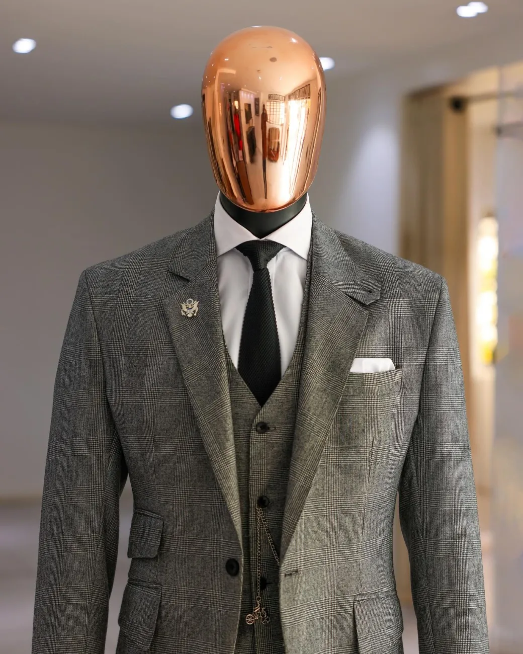 A Prince Of Wales Check Business Suit.