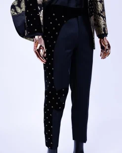 A “Prodigal” dispersed Black and splashed champagne gold suit, Layered black velvet with ss20 mixed Swarovski