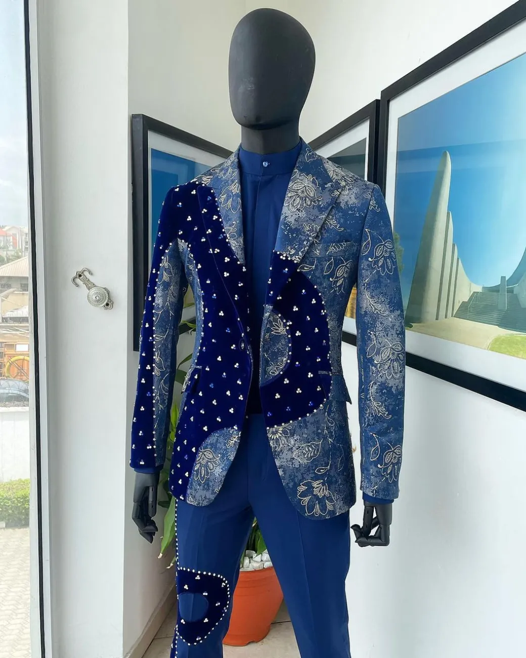 A “Prodigal” dispersed Sky blue and splashed champagne gold metallic jacquard suit